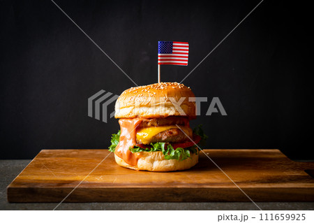 hawaiian pork burger - pork with cheese and grilled pineapple burger 111659925