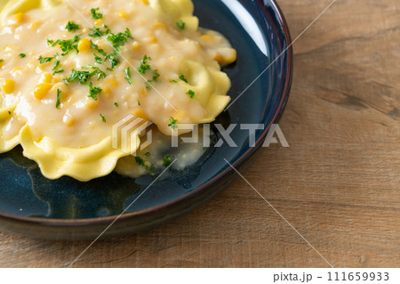 ravioli pasta with corn cheese sauce 111659933