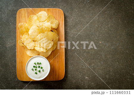 potato chips with sour cream potato chips with sour cream 111660331