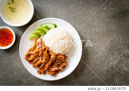 Hainanese chicken rice with fried chicken Hainanese chicken rice with fried chicken 111661678