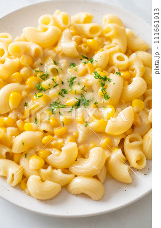 macaroni creamy corn cheese on plate 111661913