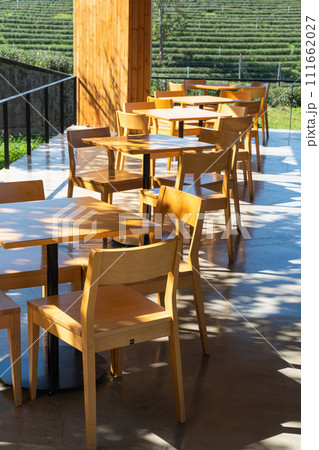 empty wood table and chair 111662027