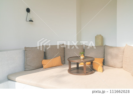 pillows on outdoor patio sofa 111662028