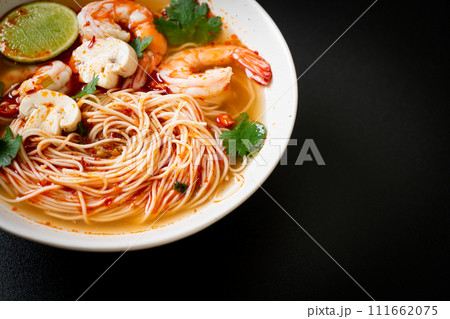 noodles with spicy soup and shrimps (Tom Yum Kung) 111662075