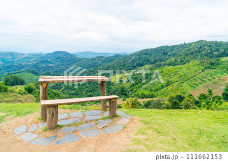 wood bar and chair with mountain hill background wood bar and chair with mountain hill background 111662153