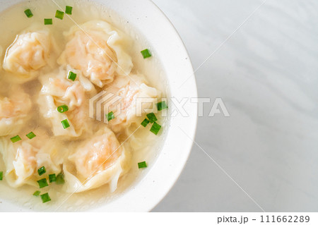 shrimp dumpling soup in white bowl shrimp dumpling soup in white bowl 111662289
