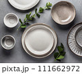 Empty plates on table flat lay. ai generated 111662972