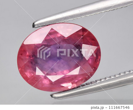 natural pink sapphire gem on the background natural pink sapphire gem on the background 111667546