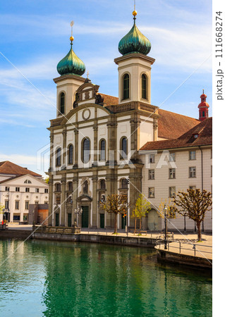 View of Jesuit church and the Reuss river in Lucerne, Switzerland 111668274
