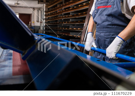 Worker at factory measures works metal production industrial 111670229