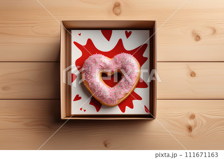 Donut in the shape of a heart. Valentine's Day Gift Concept. Donut in the shape of a heart. Valentine's Day Gift Concept. 111671163