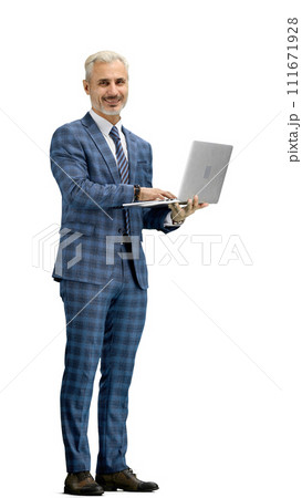 A man, full-length, on a white background, uses a laptop A man, full-length, on a white background, uses a laptop 111671928