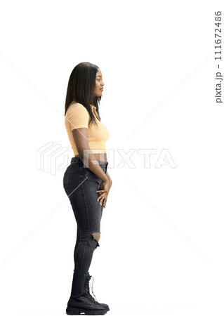 A woman, on a white background, in full height 111672486
