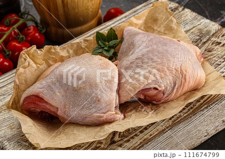 Raw chicken thigh for cooking 111674799