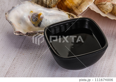 Oyster sauce in the bowl 111674806