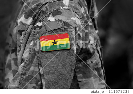 Flag of Ghana on soldiers arm. Ghana flag on military uniform. Army, troops, military, Africa (collage). Flag of Ghana on soldiers arm. Ghana flag on military uniform. Army, troops, military, Africa (collage). 111675232