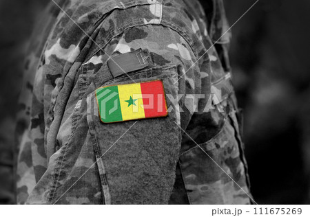 Flag of Senegal on soldiers arm. Senegal flag on military uniform. Army, troops, Africa (collage). Flag of Senegal on soldiers arm. Senegal flag on military uniform. Army, troops, Africa (collage). 111675269