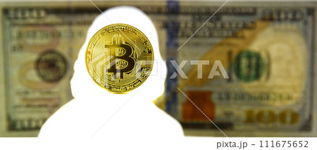 Bitcoin concept. New world currency. Gold coin of Bitcoin and silhouette of Benjamin Franklin on the one hundred dollars USA. Money concept. 111675652