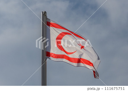 flag of the Turkish Republic of Northern Cyprus against the sky 3 111675751