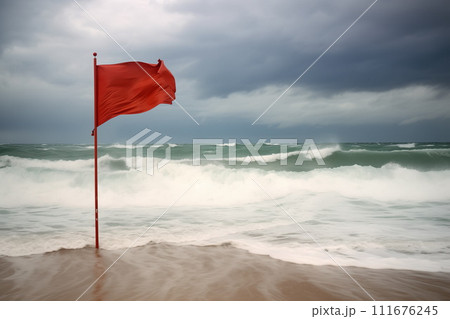 Red flag at ocean beach with big waves and strong wind. AI Generative 111676245
