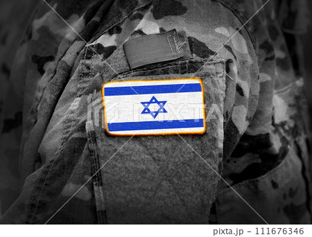 Israel flag on soldiers arm (collage). 111676346