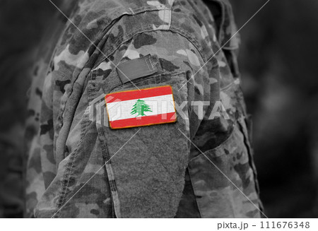 Flag of Lebanon  on military uniforms.  Lebanon  flag on soldiers arm (collage). 111676348