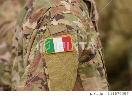 Flag of Italy on soldiers arm (collage). Flag of Italy on soldiers arm (collage). 111676397