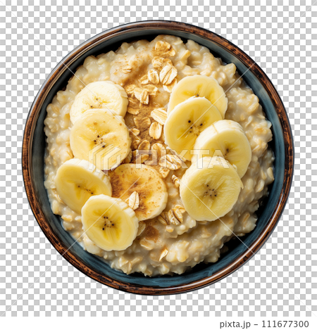 Oatmeal with banana, top view 111677300