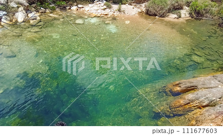 beautiful turquoise waterfall pool in Serra da Canastra, Minas Gerais, Brazil 111677603