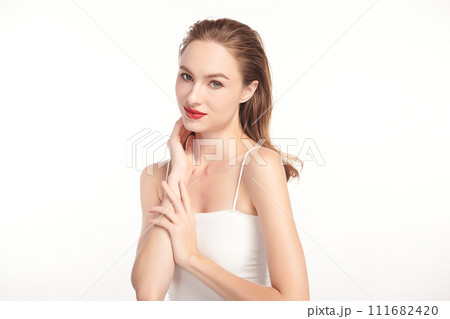 Beautiful young woman with clean fresh skin on white background, Face care, Facial treatment, Cosmetology, beauty and spa, women portrait. Beautiful young woman with clean fresh skin on white background, Face care, Facial treatment, Cosmetology, beauty and spa, women portrait. 111682420