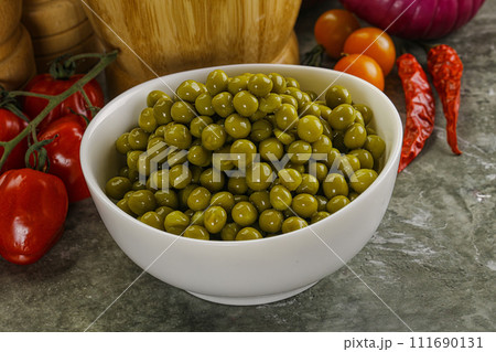 Sweet canned young green peas Sweet canned young green peas 111690131