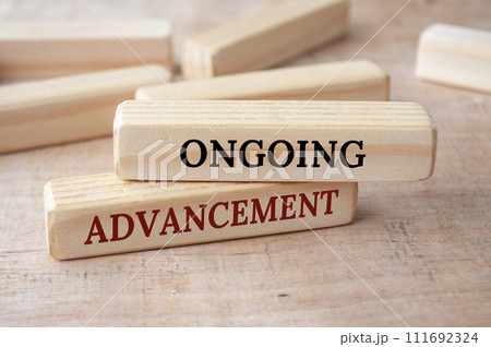 Enduring advancement text on wooden blocks. Operational excellence concept 111692324