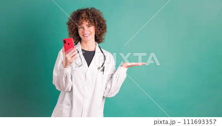 Cheerful woman doctor with smartphone Cheerful woman doctor with smartphone 111693357