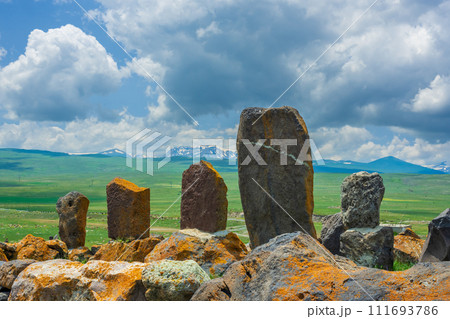 Armenian architectural shrines - ancient khachkars near the Artsvatrich chapel on the shore of Lake Sevan 111693786