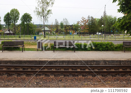 Bench at the railway station in city Bench at the railway station in city 111700592