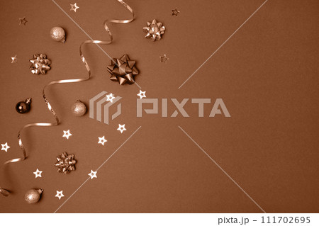 New Year Brown Background. Golden Decoration. Christmas Greeting Card Mockup. Sparkle Baubles. Top view, Copy Space. Gold Balls, Confetti on a Beige Festive Backdrop. Banner Template. Xmas Frame. New Year Brown Background. Golden Decoration. Christmas Greeting Card Mockup. Sparkle Baubles. Top view, Copy Space. Gold Balls, Confetti on a Beige Festive Backdrop. Banner Template. Xmas Frame. 111702695