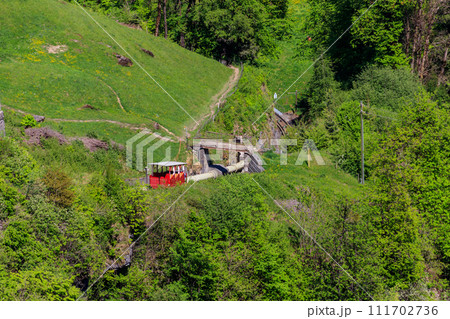 Reichenbachfall funicular (Reichenbachfall-Bahn) from Willigen, near Meiringen, to the famous Reichenbach Falls, Switzerland Reichenbachfall funicular (Reichenbachfall-Bahn) from Willigen, near Meiringen, to the famous Reichenbach Falls, Switzerland 111702736