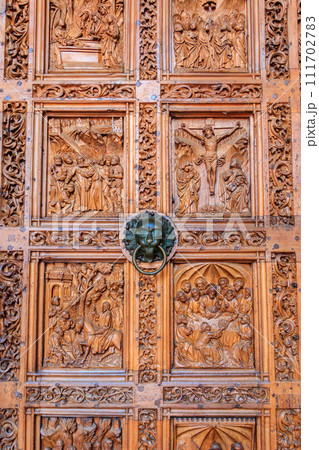 Close-up of a wooden door of Konstanz Cathedral in Konstanz (also known as Constance), Germany Close-up of a wooden door of Konstanz Cathedral in Konstanz (also known as Constance), Germany 111702783
