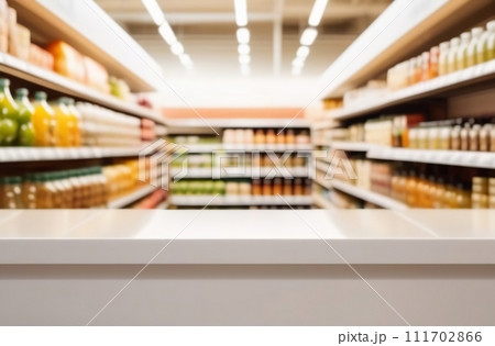 Empty table top with supermarket blurred defocused panorama, bokeh light. Backdrop for display montage products. Blank wood textured counter, blur grocery, bio eco market store background. Front view 111702866