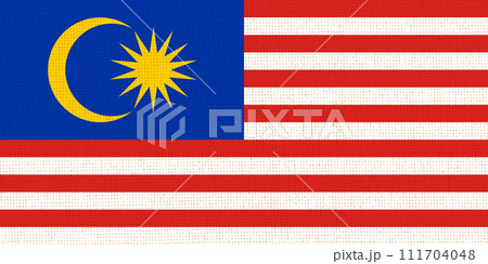 Flag of Malaysia. Malaysian flag on fabric surface. National symbol 111704048