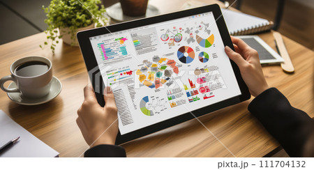 AI-generated content. Business Growth and Financial Analysis: A Professional Workplace with Computer and Graphs 111704132