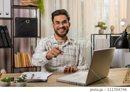 Businessman programmer software developer pointing to camera making choice happy expression approve 111704746