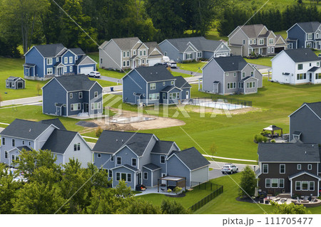 Housing market in the USA. Residential homes in suburban sprawl development in Rochester, New York. Low-density two story private houses in rural suburbs 111705477