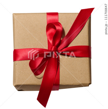 Box is wrapped in brown paper and red ribbon on a white isolated background Box is wrapped in brown paper and red ribbon on a white isolated background 111708647