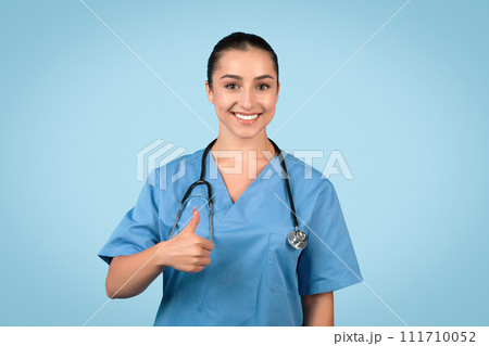 Happy female nurse giving thumbs up and smiling Happy female nurse giving thumbs up and smiling 111710052