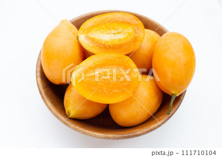 Marian plum fruit isolated on white background 111710104