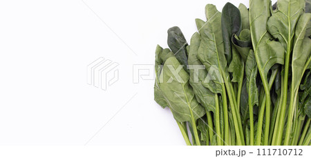 Fresh spinach on white background Fresh spinach on white background 111710712