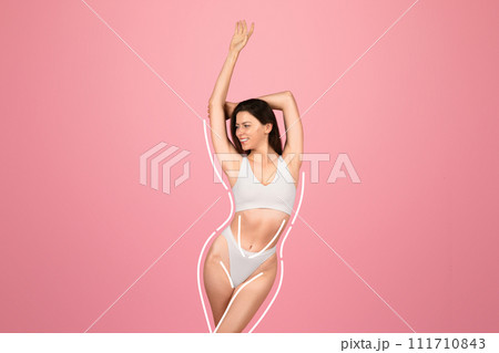 A smiling woman with dark hair is playfully stretching, highlighted by a white line drawing of her figure 111710843