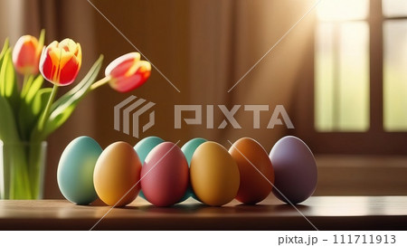 Table with vase of tulips, colorful Easter eggs. Eggs and vase of tulips on kitchen table near window. Happy Easter greeting card, banner, festive background. Blurred background. Copy space. 111711913