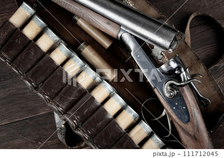 12 gauge break action smooth bored double barreled side shotgun with cases. 111712045